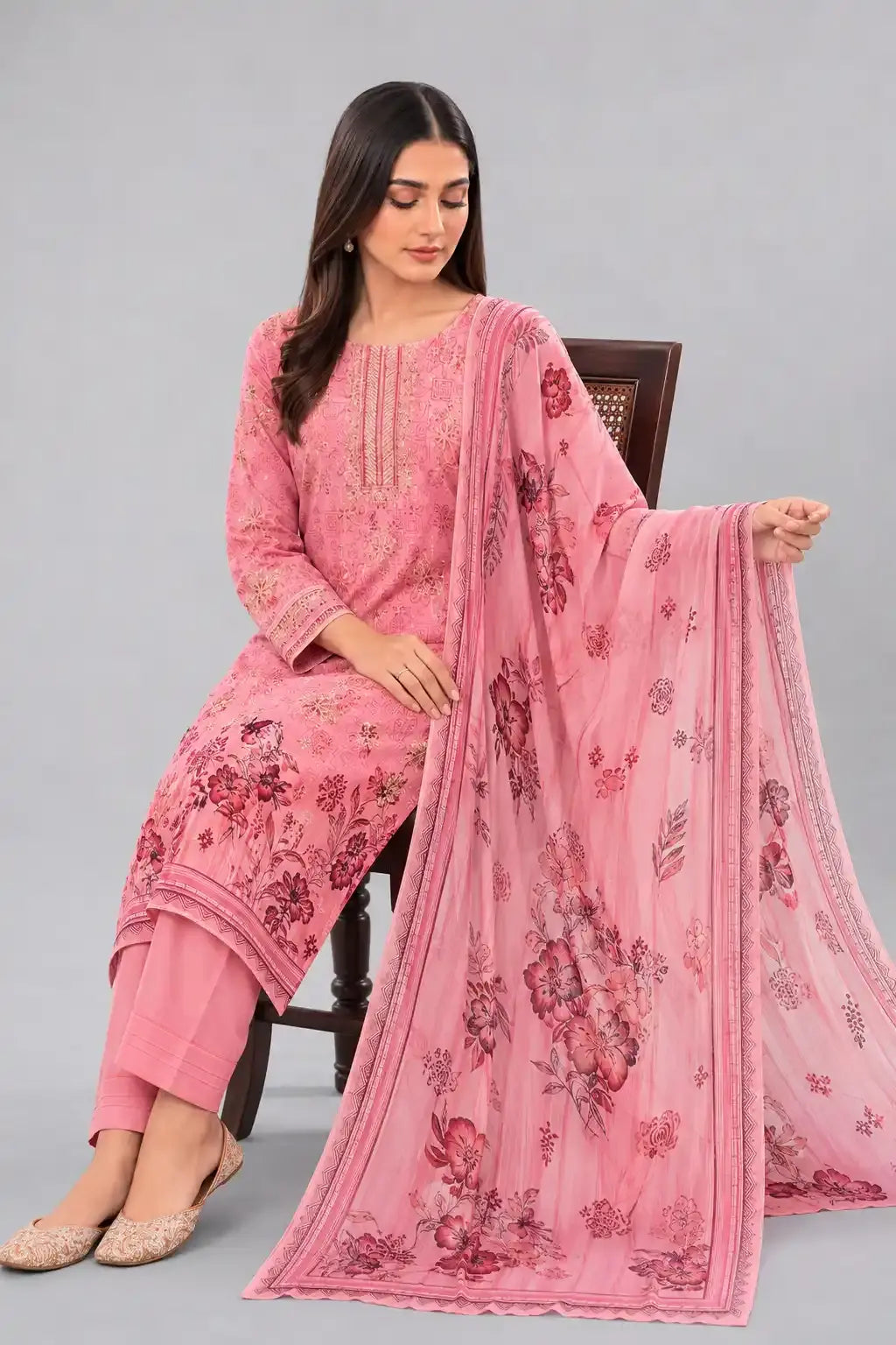 Woman in a Bin saeed lawn design with floral patterns