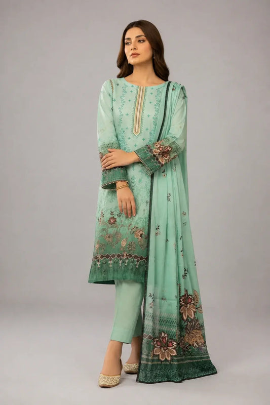 Woman wearing a mint green printed traditional outfit