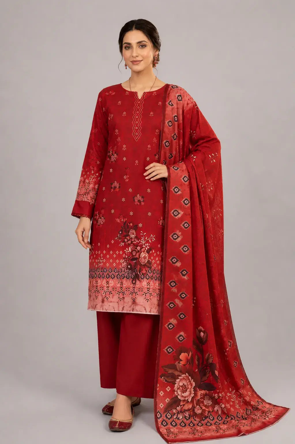 Red shalwar kameez design with matching dupatta on a gray background