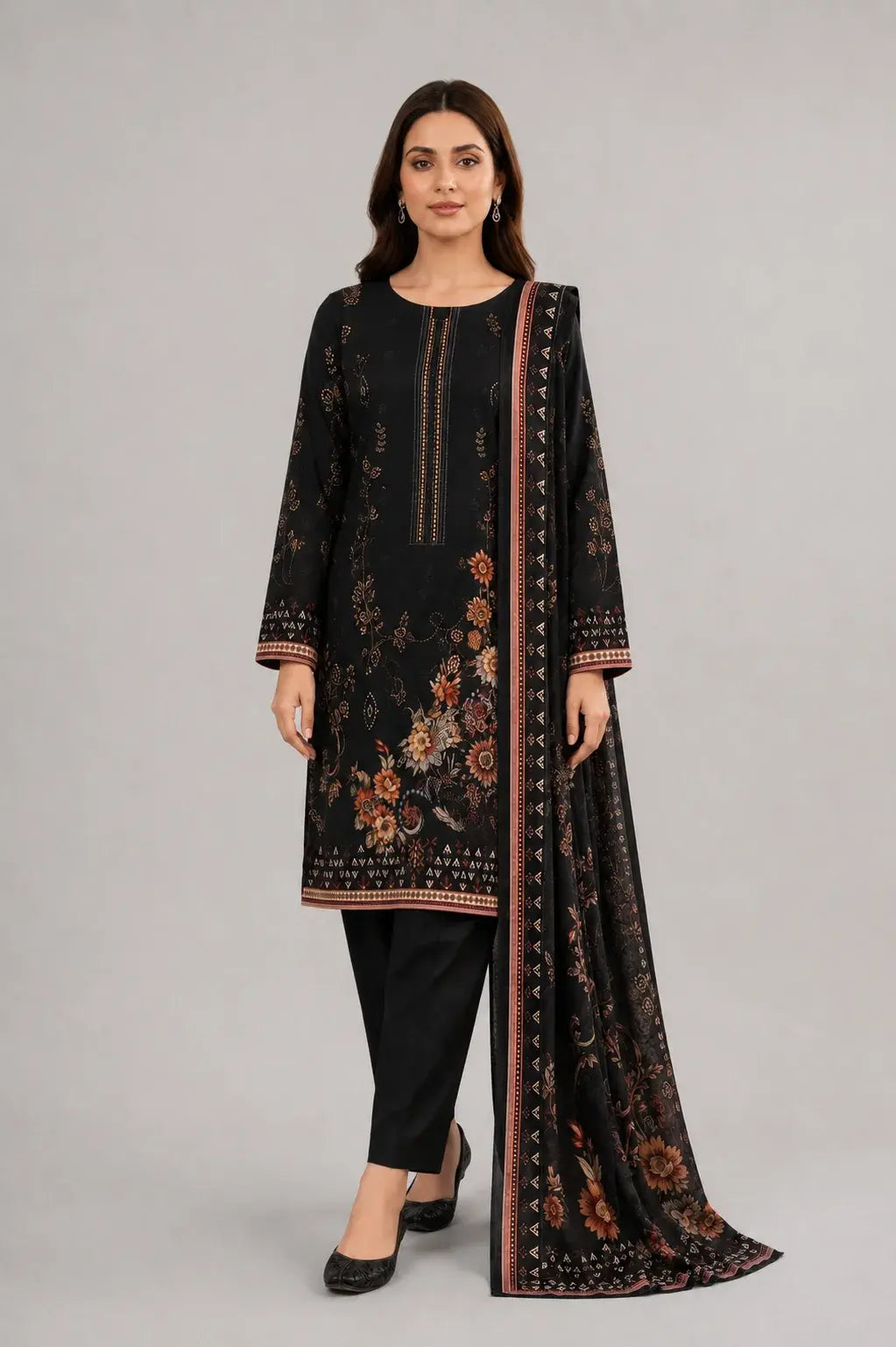 Woman wearing a black shalwar kameez dress design with a matching dupatta