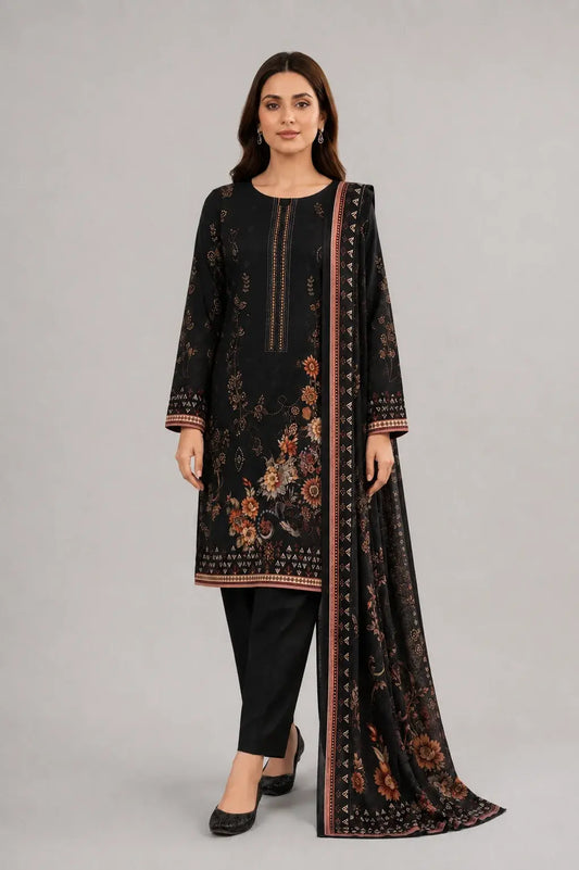 Woman wearing a black shalwar kameez dress design with a matching dupatta